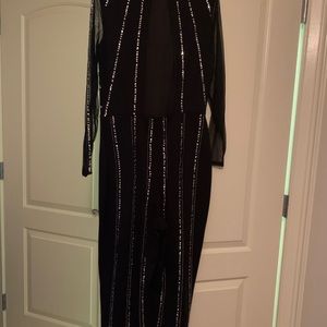 Like NEW (worn once for a few hours) BEBE jumpsuit